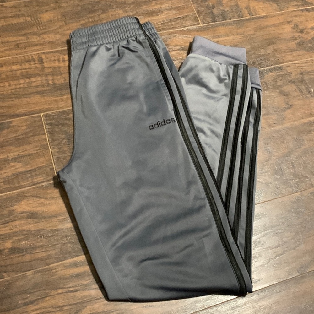 grey and black adidas sweatpants